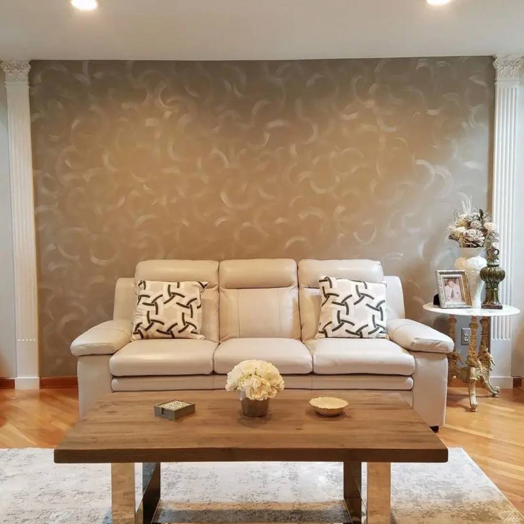 A living room with a couch and table