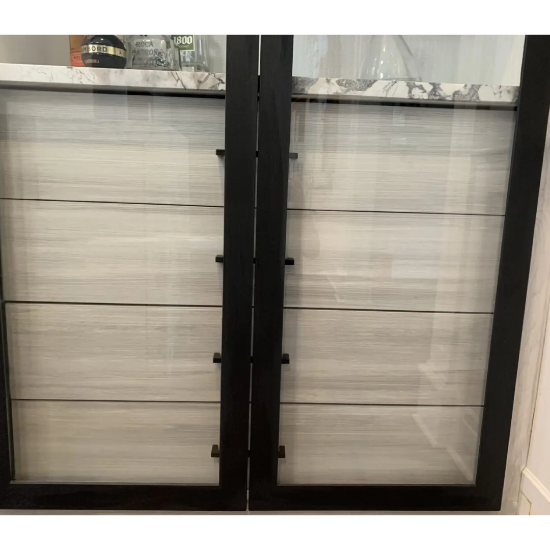 A double door with glass panels in the middle of it.