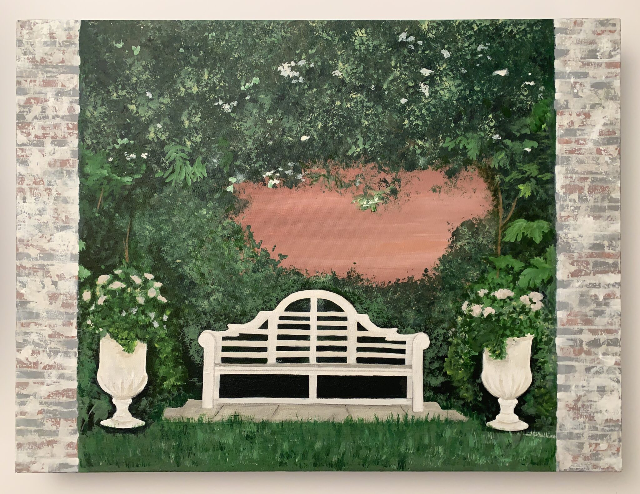 Garden scene with a white bench.